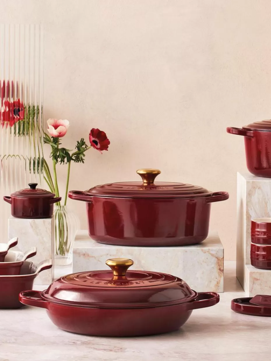 Töpfe-Le Creuset Ovaler Bräter Signature Collection aus Gusseisen Weinrot, Goldfarben